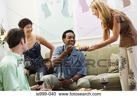 Hostess offering canapes View Large Photo Image Stock Image - Hostess offering canapes. Fotosearch