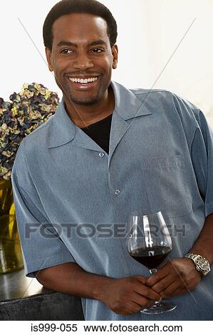 Stock Photography - Man with a glass of wine. Fotosearch