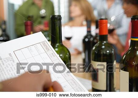Stock Image - Wine tasting evening. Fotosearch