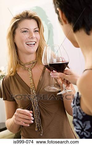 Women having a toast View Large Photo Image Picture - Women having a toast. Fotosearch