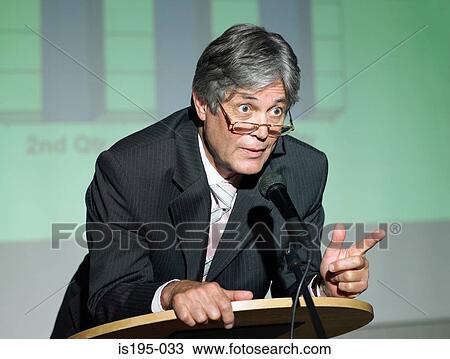 Businessman giving a speech View Large Photo Image Stock Image - Businessman giving a speech. Fotosearch