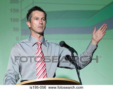 Stock Photograph - Businessman giving a speech. Fotosearch
