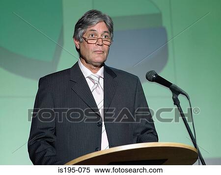 Businessman giving a speech View Large Photo Image Stock Photography - Businessman giving a speech. Fotosearch
