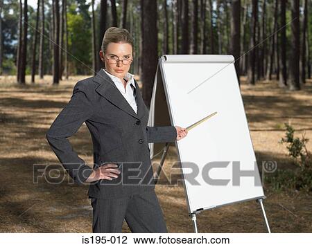 Businesswoman doing presentation View Large Photo Image Stock Image - Businesswoman doing presentation. Fotosearch