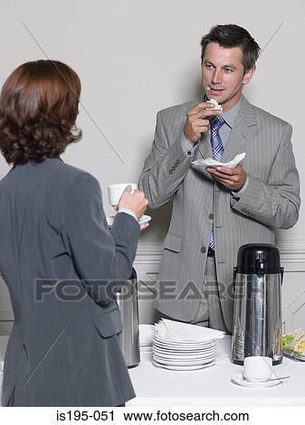 Office workers having a coffee break View Large Photo Image Stock Image - Office workers having a coffee break. Fotosearch