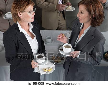 Office workers having a coffee break View Large Photo Image Stock Photo - Office workers having a coffee break. Fotosearch