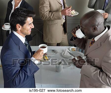 Office workers having a coffee break View Large Photo Image Stock Photo - Office workers having a coffee break. Fotosearch