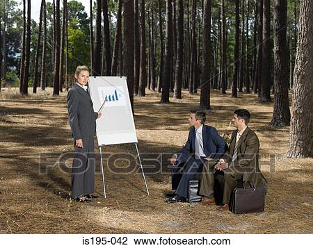 Office workers holding meeting in forest View Large Photo Image Stock Image - Office workers holding meeting in forest. Fotosearch