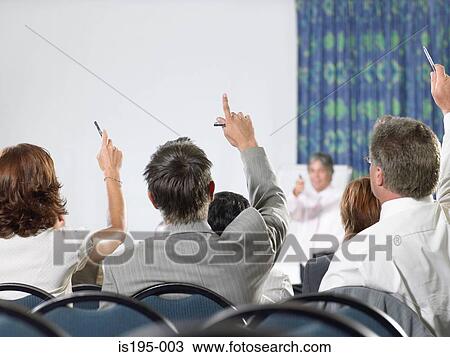 Office workers listening to a speech View Large Photo Image Stock Image - Office workers listening to a speech. Fotosearch