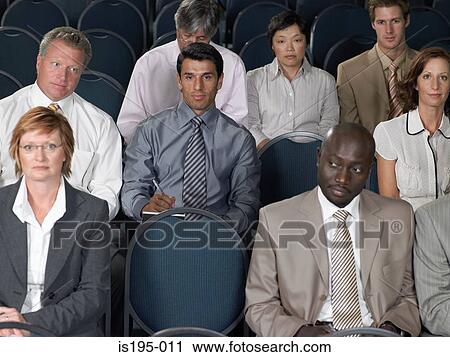 Office workers listening to presentation View Large Photo Image Stock Image - Office workers listening to presentation. Fotosearch