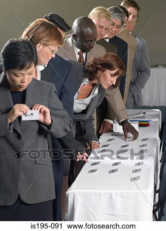 Office workers with name tags View Large Photo Image Stock Image - Office workers with name tags. Fotosearch