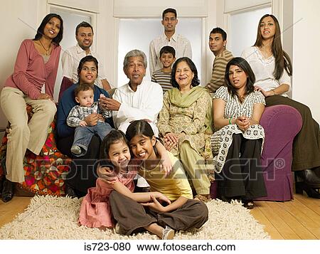 Large indian family in living room View Large Photo Image Stock Image - Large indian family in living room. Fotosearch