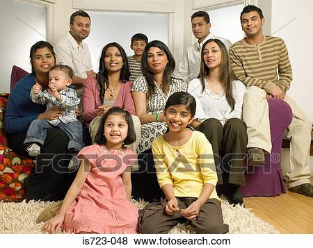 Large indian family in living room View Large Photo Image Stock Photo - Large indian family in living room. Fotosearch