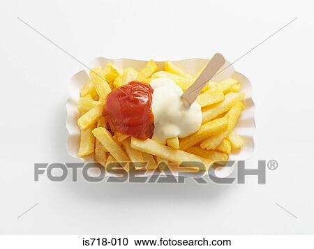 Chips with ketchup and mayonnaise View Large Photo Image Stock Image - Chips with ketchup and mayonnaise. Fotosearch