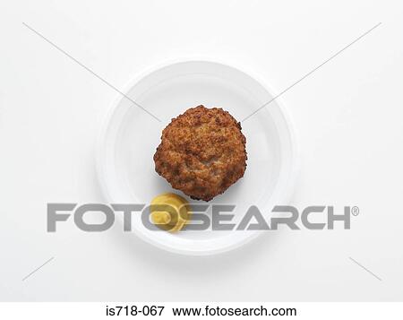 Stock Photo - Meatball and mustard. Fotosearch