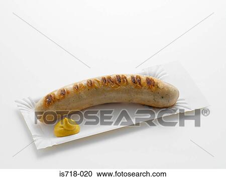 Stock Image - Sausage with mustard. Fotosearch