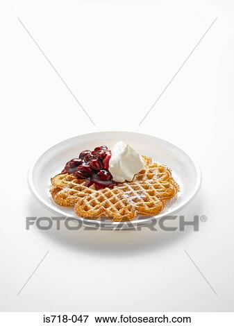 Stock Photo - Waffle with cherries and cream. Fotosearch
