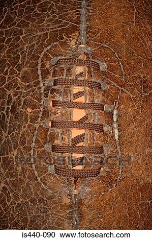 Stock Image - Close up of old rugby ball. Fotosearch