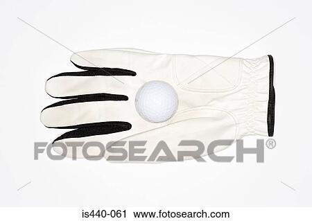 Golf glove and golf ball View Large Photo Image Stock Image - Golf glove and golf ball. Fotosearch
