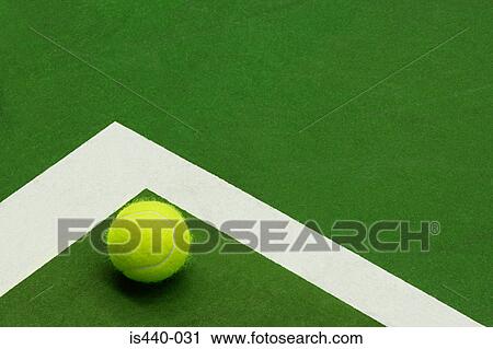 Tennis ball on court View Large Photo Image Stock Image - Tennis ball on court. Fotosearch