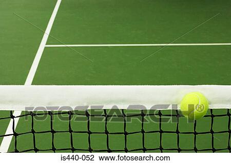 Tennis ball on court View Large Photo Image Stock Image - Tennis ball on court. Fotosearch