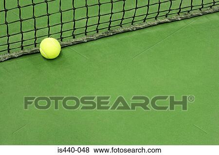 Tennis ball on court View Large Photo Image Stock Photo - Tennis ball on court. Fotosearch