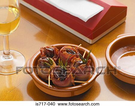 Bacon wrapped dates View Large Photo Image Stock Image - Bacon wrapped dates. Fotosearch