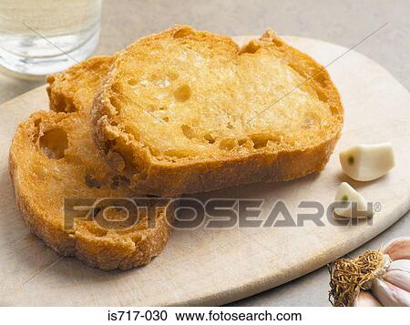 Stock Image - Crostini and garlic. Fotosearch