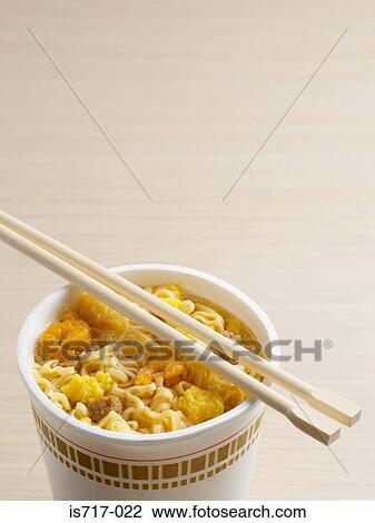 Stock Image - Noodles in a cup. Fotosearch