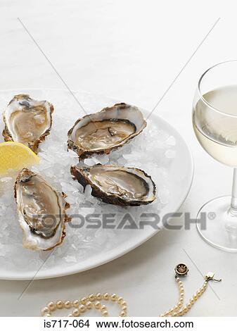 Oyster and pearls View Large Photo Image Picture - Oyster and pearls. Fotosearch