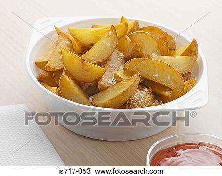Potato wedges View Large Photo Image Stock Image - Potato wedges. Fotosearch