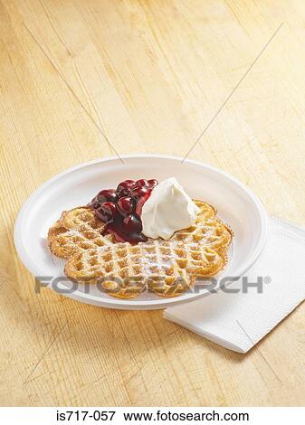 Stock Photo - Waffles with cherry and cream. Fotosearch