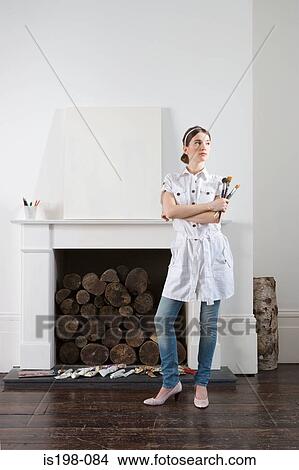 Picture - Artist with blank canvas. Fotosearch