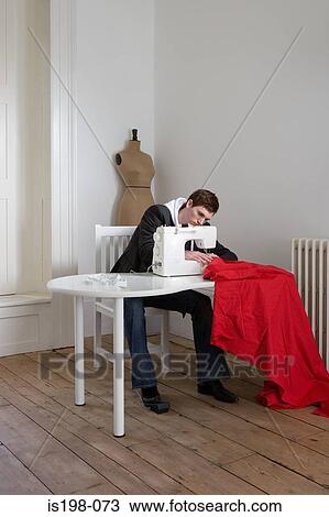 Man sewing red fabric View Large Photo Image Stock Image - Man sewing red fabric. Fotosearch