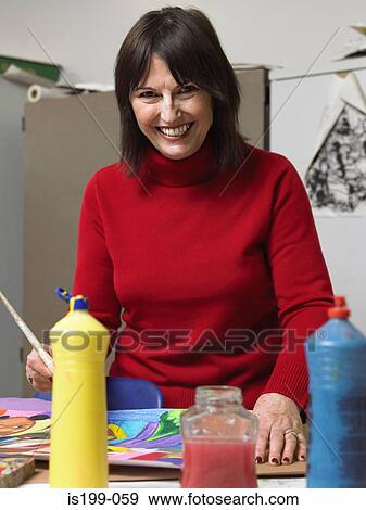 Stock Photo - Mature art student. Fotosearch