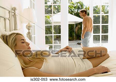 Couple in bedroom View Large Photo Image Stock Image - Couple in bedroom. Fotosearch