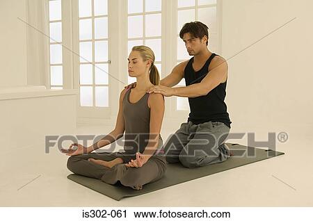 Man massaging woman's shoulders View Large Photo Image Stock Image - Man massaging woman's shoulders. Fotosearch