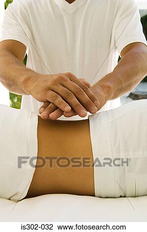 Woman having reiki treatment View Large Photo Image Stock Image - Woman having reiki treatment. Fotosearch