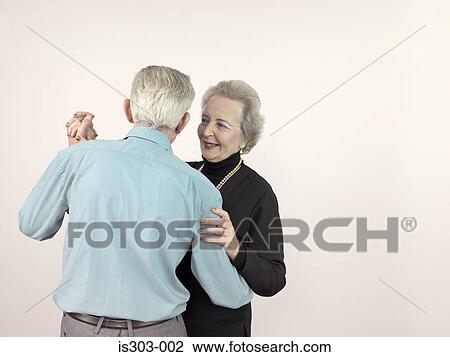 Stock Image - Senior couple dancing. Fotosearch