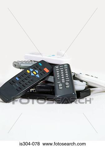 Stock Photo - Stack of remote controls. Fotosearch