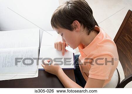 Boy doing homework View Large Photo Image Stock Photograph - Boy doing homework. Fotosearch