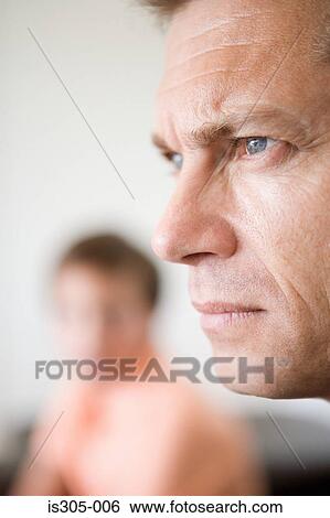 Stock Photograph - Father and blurred son. Fotosearch