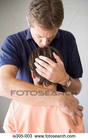 Father protecting son View Large Photo Image Stock Image - Father protecting son. Fotosearch