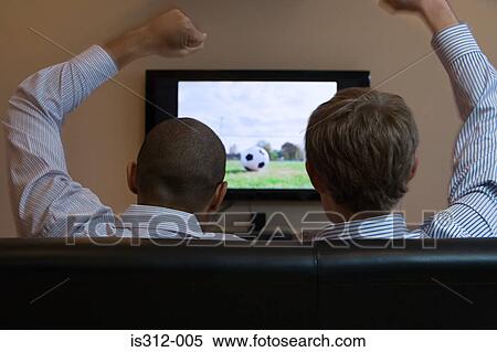 Men watching football on television View Large Photo Image Stock Photography - Men watching football on television. Fotosearch