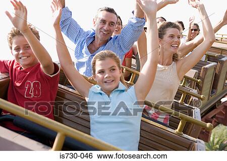 Family riding on rollercoaster View Large Photo Image Stock Photograph - Family riding on rollercoaster. Fotosearch