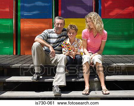 Family sitting on steps View Large Photo Image Stock Image - Family sitting on steps. Fotosearch