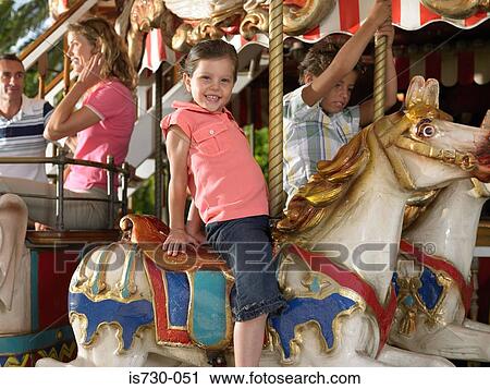Kids on a carousel View Large Photo Image Stock Image - Kids on a carousel. Fotosearch