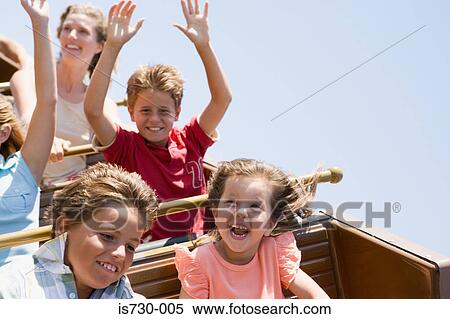 Kids on a roller coaster View Large Photo Image Stock Photography - Kids on a roller coaster. Fotosearch