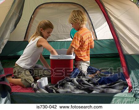 Kids reaching into coolbox View Large Photo Image Stock Image - Kids reaching into coolbox. Fotosearch