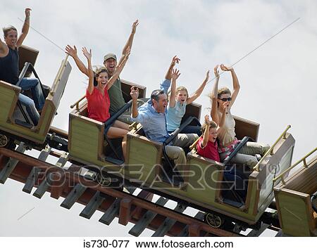 Stock Photo - People on a rollercoaster. Fotosearch
